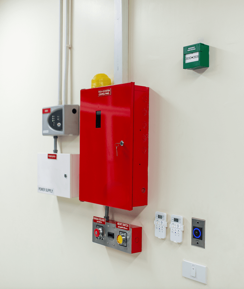 Fire alarm control panel on wall